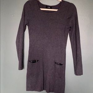Gray sweater dress with edgy leather pockets